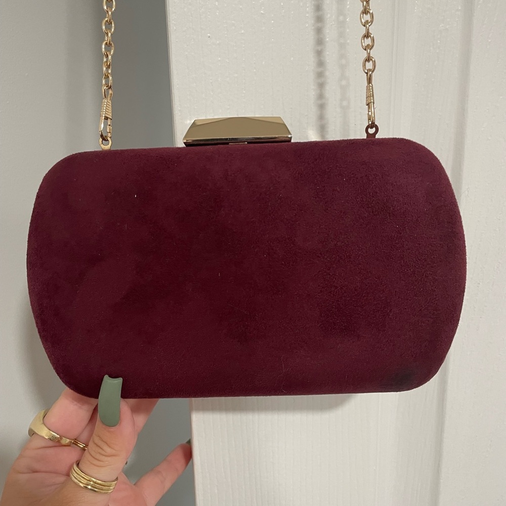 Versatile Burgundy Suede clutch/ purse with gold chain.